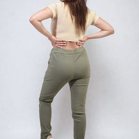 Olive khaki drawstring tapered trousers with side pockets and ankle-length fit