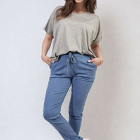 Blue drawstring tapered trousers with side pockets