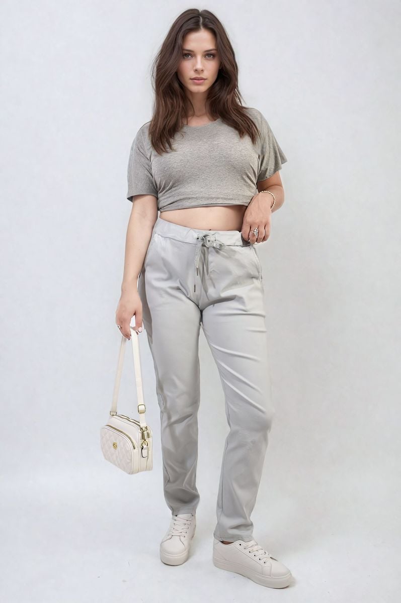 Grey drawstring tapered trousers with side pockets and cuffed ankle hems
