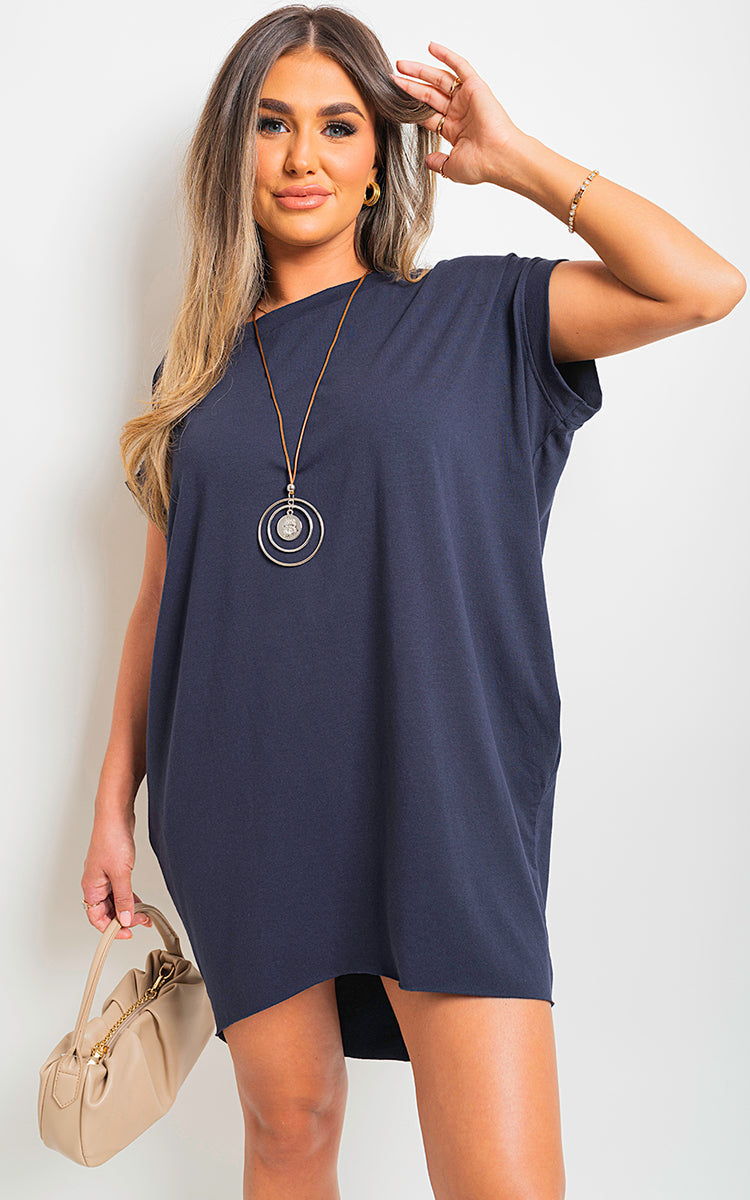 Navy short-sleeve tunic top with front pockets, relaxed straight cut.