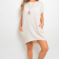 White short-sleeve tunic top with draped sides and crew neckline