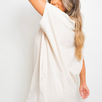 White short-sleeve tunic top with relaxed drape and rounded hem
