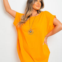 Short sleeve tunic top with front pockets, orange, loose fit, round neckline