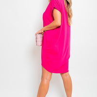 Short sleeve tunic top with front pockets, bright pink, loose fit, round neckline