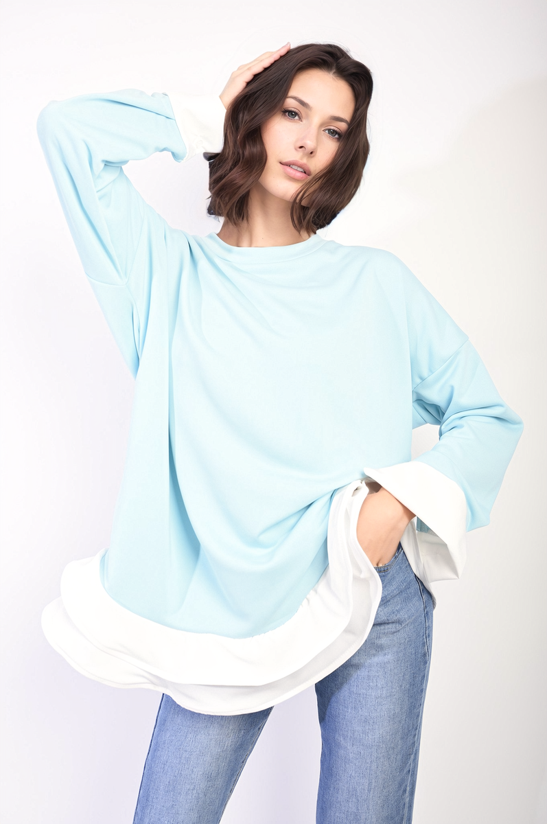 Sky blue oversized dress top with long sleeves and white contrast ruffle hem