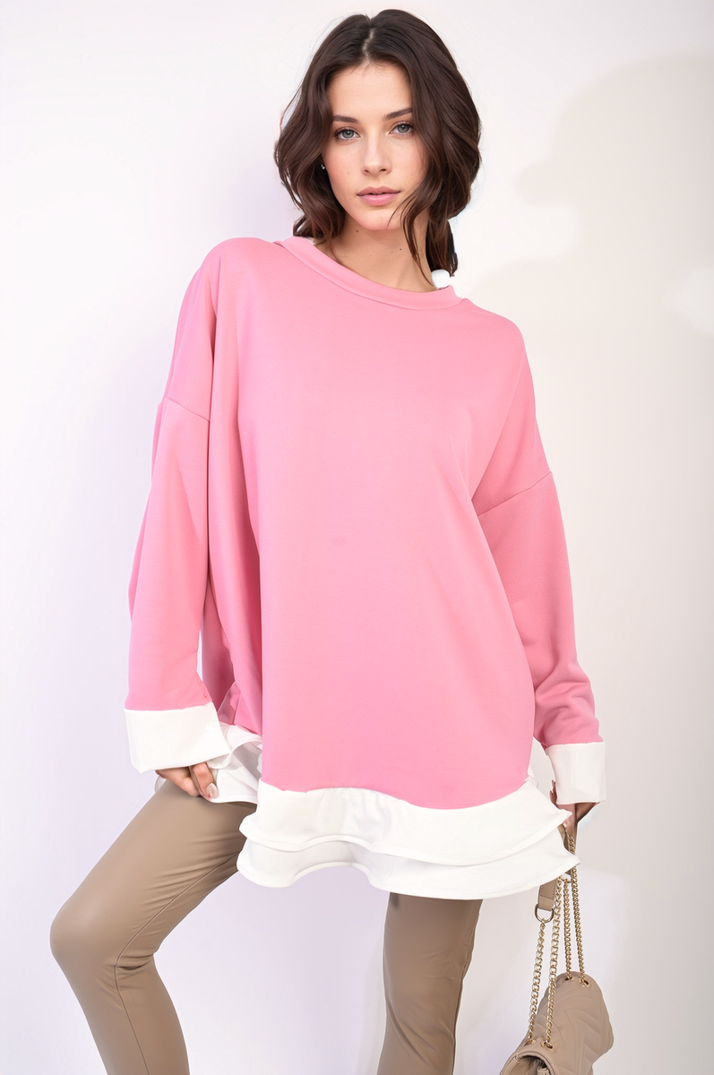 Pink oversized long-sleeve dress top with contrast white ruffle hem