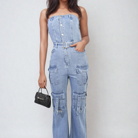 Blue denim strapless cargo jumpsuit with large cargo pockets and front button placket