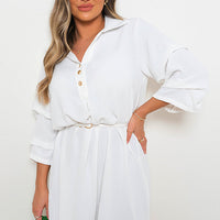White shirt dress with collar and button front, loose three-quarter sleeves, belted waist