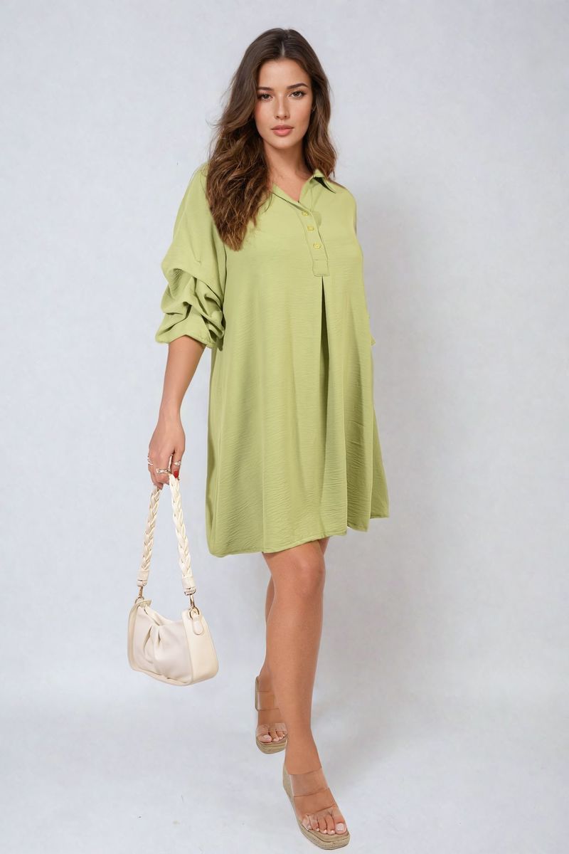 Pale green shirt dress with collar and loose sleeves, mini length.