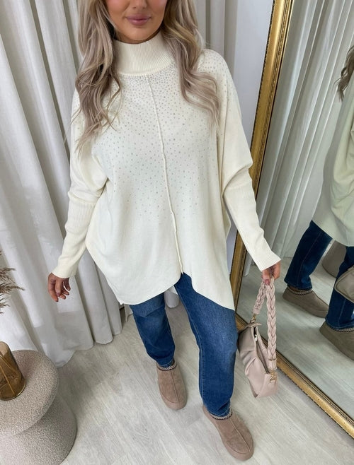 Ivory oversized knitted jumper with rhinestone dot pattern, high neck and long sleeves