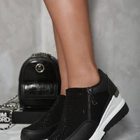 Black platform trainers with rhinestone front panel and side zip, thick sole