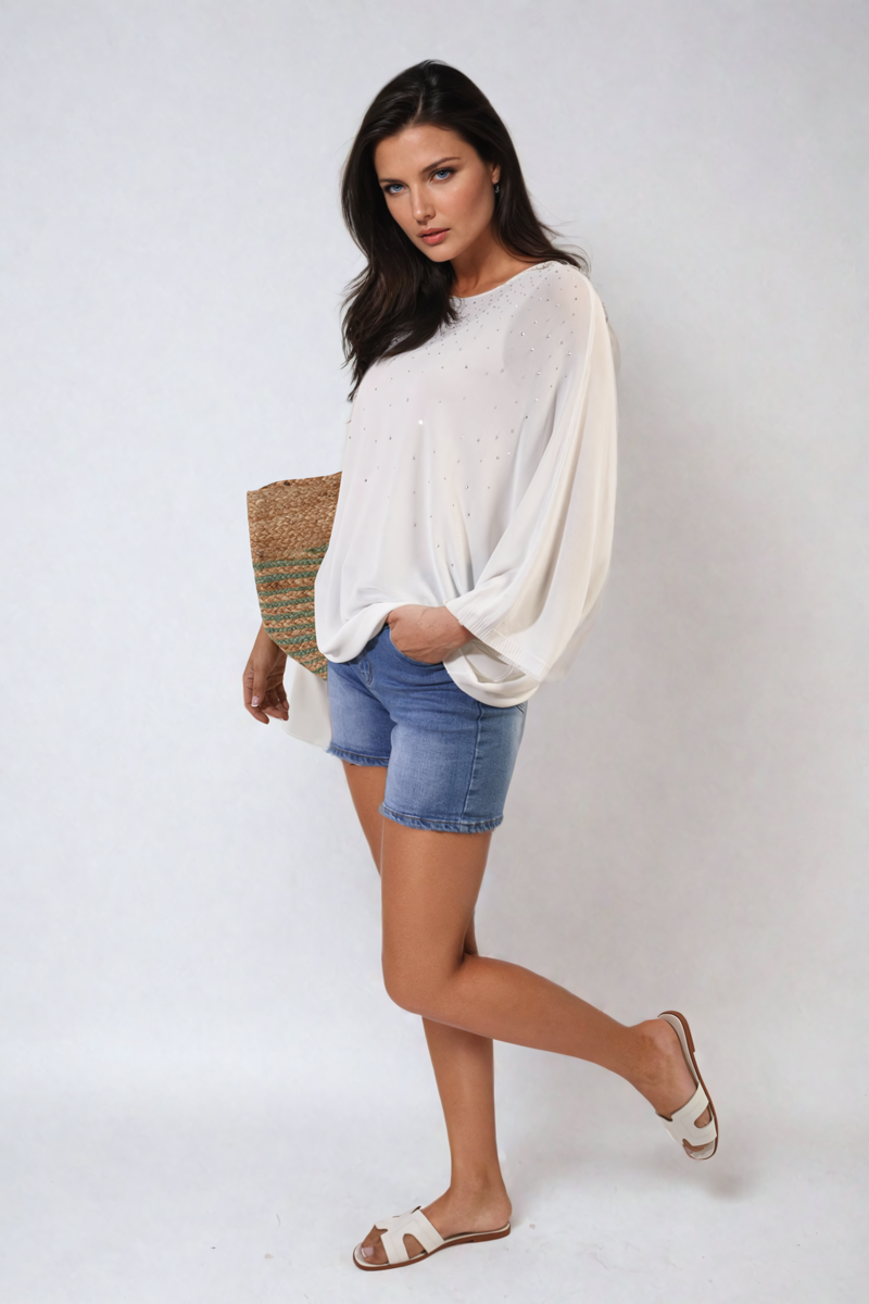 Oversized white round-neck top with subtle studded dot embellishment