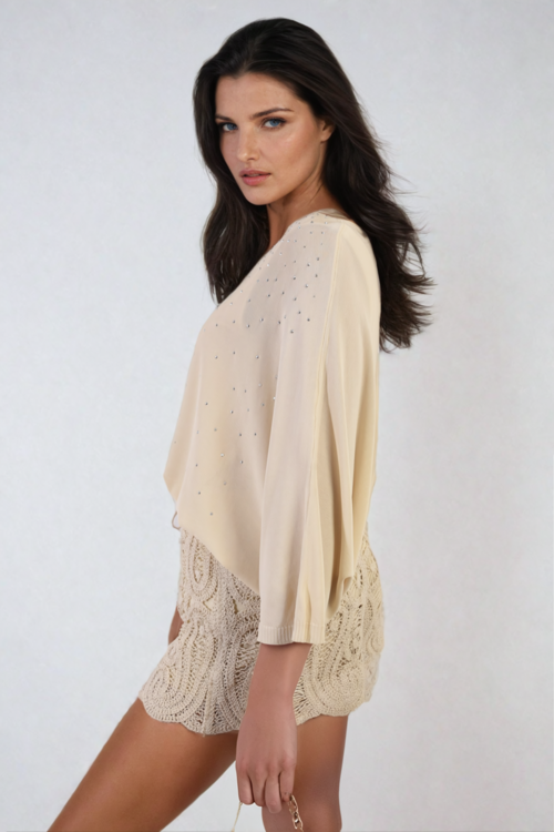 Oversized cream round-neck top with small studded dot detail
