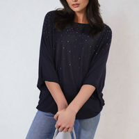 Oversized dark round-neck top with studded speckle detail, wide three-quarter sleeves