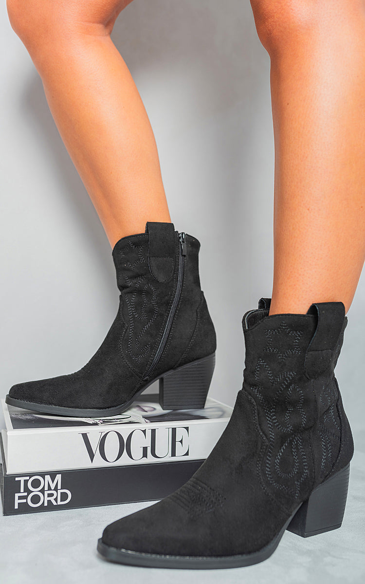Black ankle boots with western embroidery, side zipper, and mid block heel