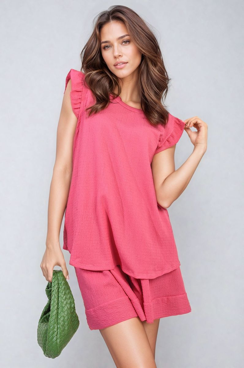 Pink ruffle-trim sleeve top and matching shorts co-ord set, relaxed silhouette