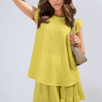Ruffle-trim sleeve top and shorts set in bright yellow with layered ruffle hem