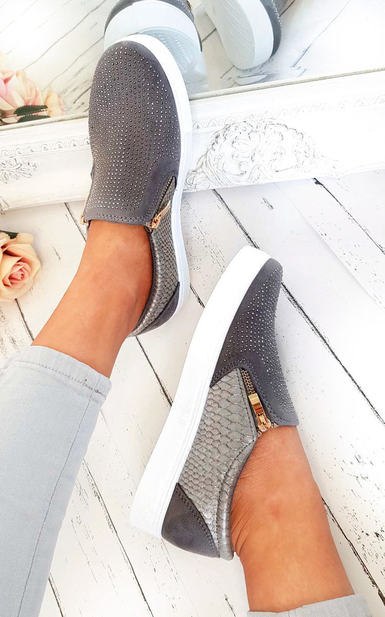 Grey slip-on trainer with diamante-look upper and gold-trim zip front, textured panels.