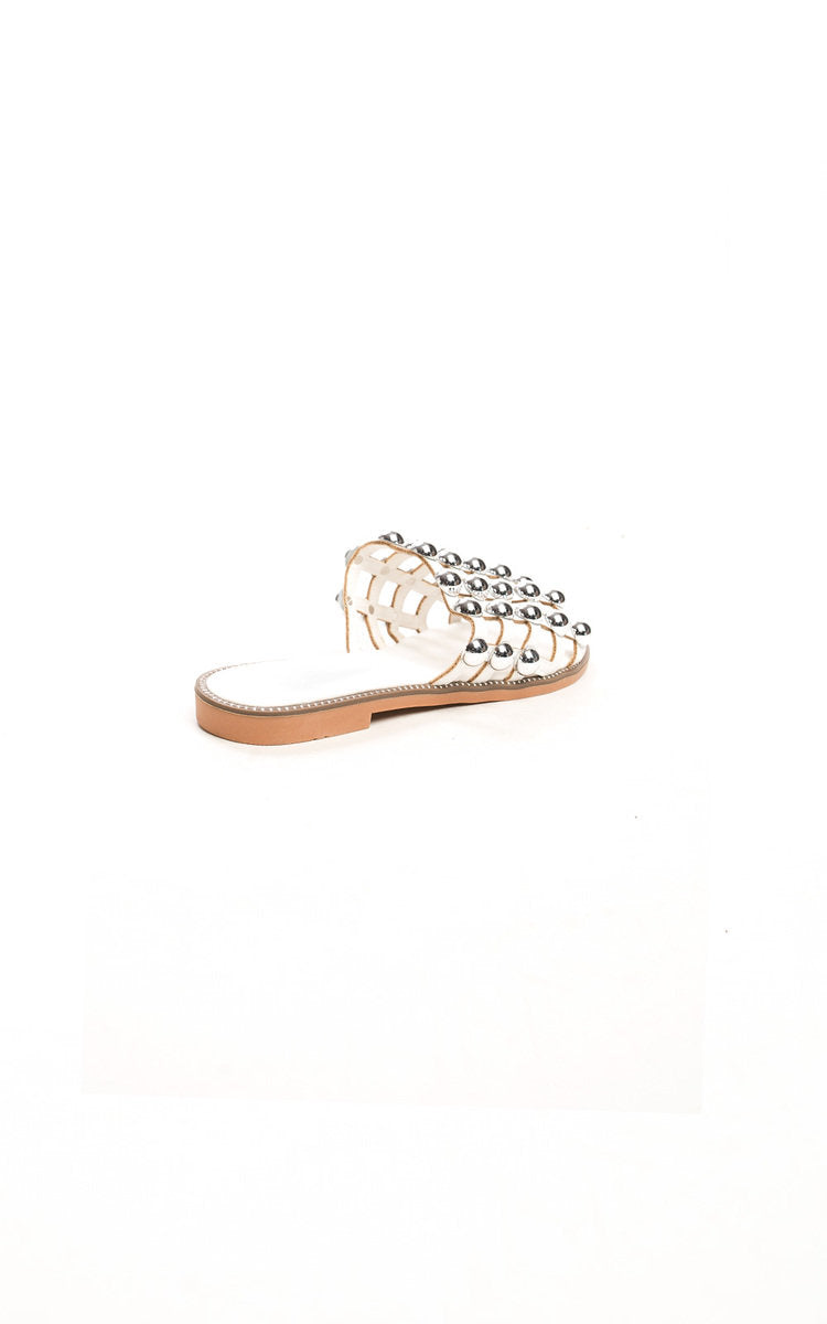 Studded lattice flat slide sandal, jeweled strap across toes and tan sole