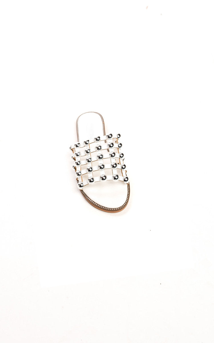 Studded lattice flat slide sandal, crystal-toned grid straps and tan sole