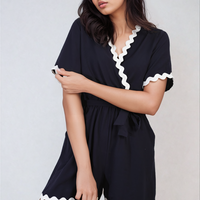 Black wrap playsuit with contrast scalloped trim and waist tie, short sleeves