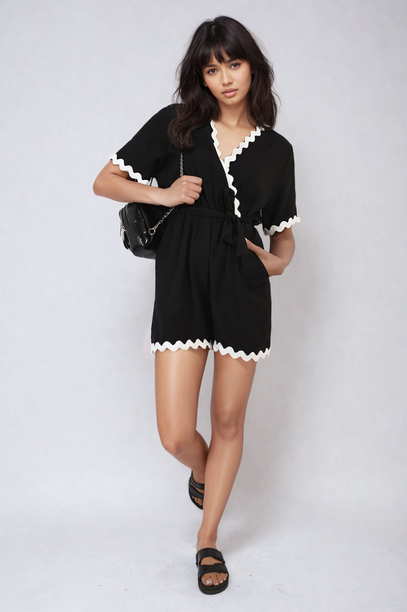 Black wrap playsuit with scalloped V neckline and waist-tie belt