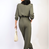 Olive green button-front collar jumpsuit with drawstring waist and gathered jogger cuffs.