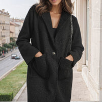 Textured button-front jacket with flap pockets, long sleeves, black