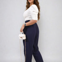 Navy high-waist drawstring trousers with side pockets and relaxed tapered legs