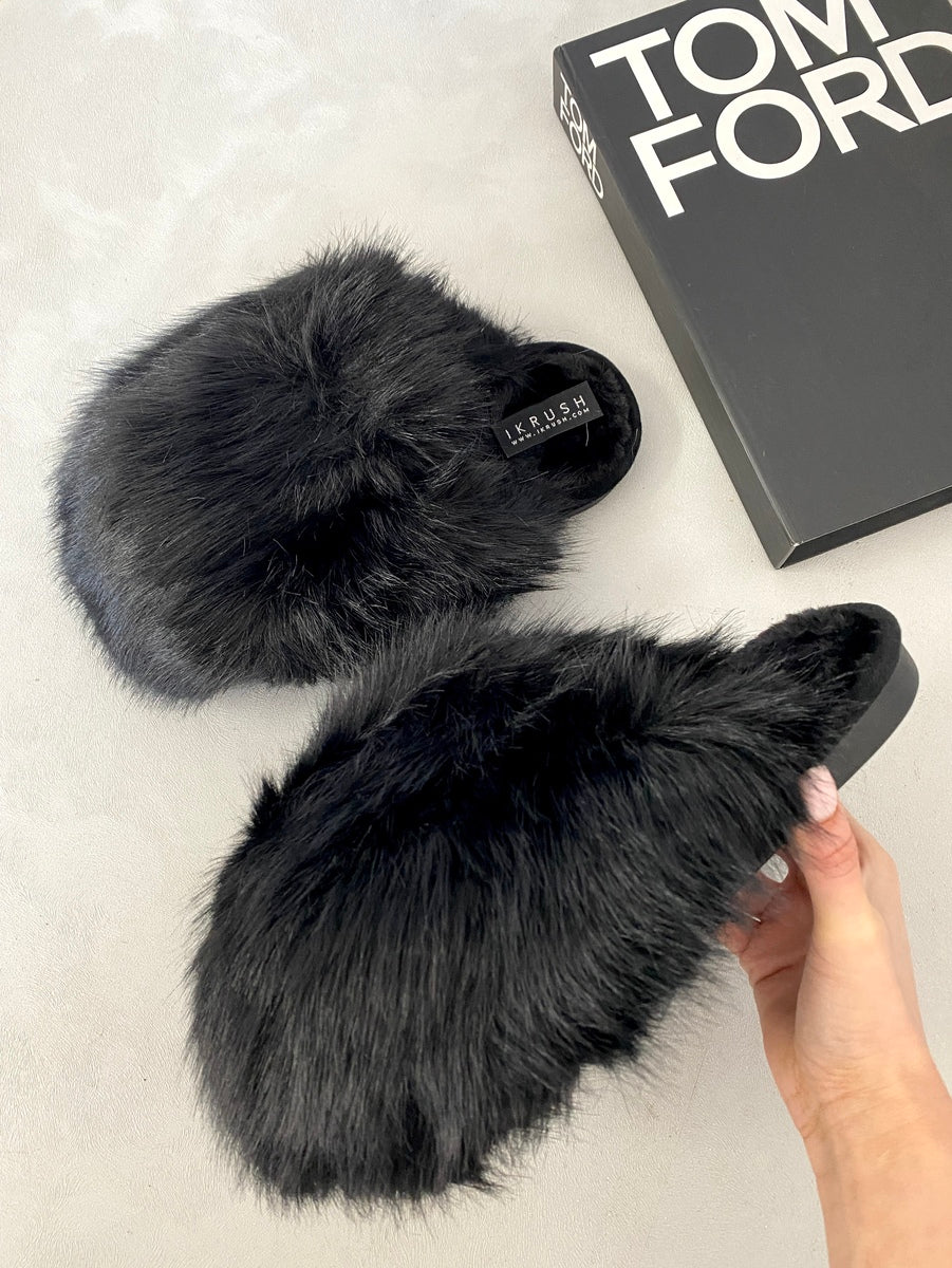 Pair of black faux fur winter sandals, slip-on slides with fuzzy straps