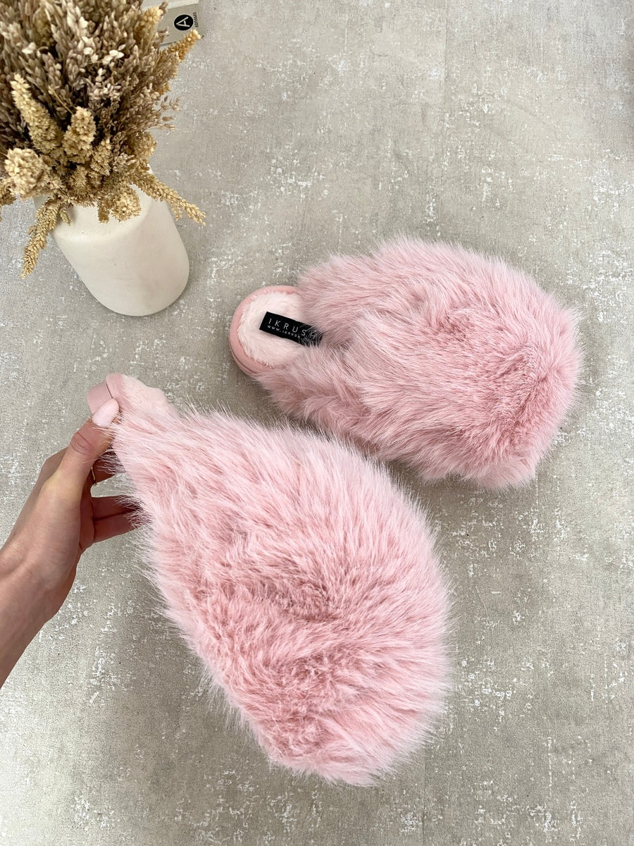 Pink fluffy faux-fur slide sandals with plush strap and open-toe silhouette