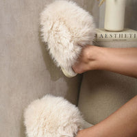 Beige fluffy faux-fur slide sandals with plush strap and open toe