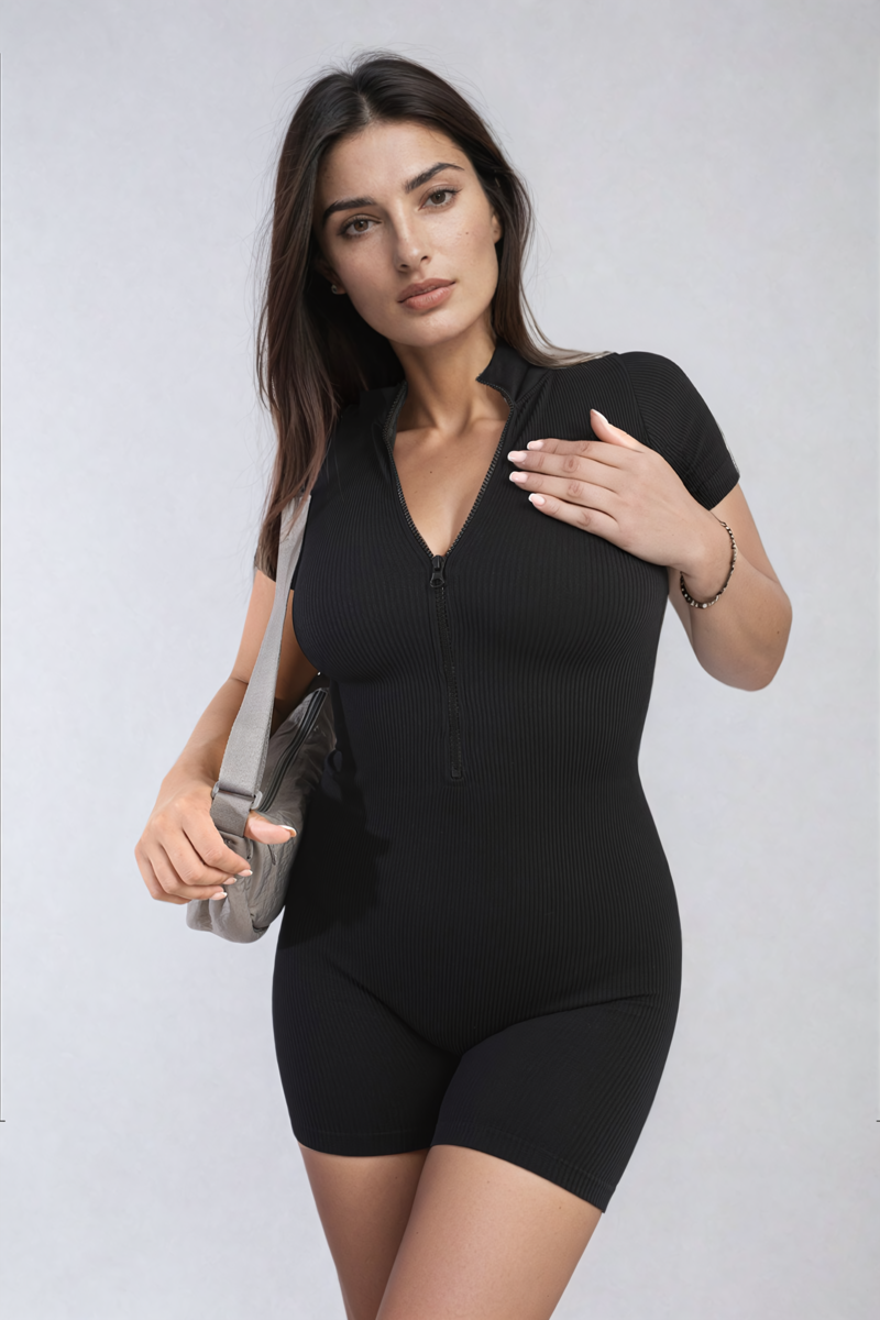 Black rib knit zip-front short sleeve playsuit with fitted shorts