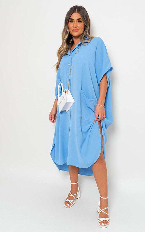 Light blue button-down collared midi dress with two front pockets and waist tie