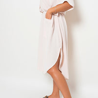 White button-front collared midi dress with two front pockets and side slit
