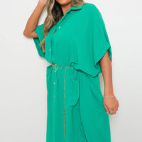 Green button-down collared midi dress with two front pockets and belt tie