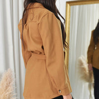 Camel belted jacket with tie waist and button details, back view