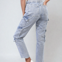 Light blue denim cargo jeans with stitched waist and multi-flap thigh pockets
