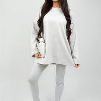 Light grey oversized crewneck sweatshirt with long sleeves, front view