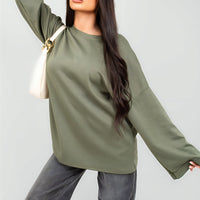 Olive green oversized crewneck sweatshirt with long sleeves, front view