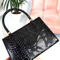 Faux Leather Handbag in Lilac with Top Handle and Chain Strap
