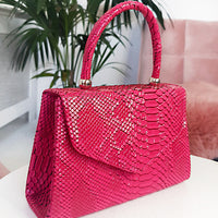 Faux Leather Handbag in Lilac with Top Handle and Chain Strap