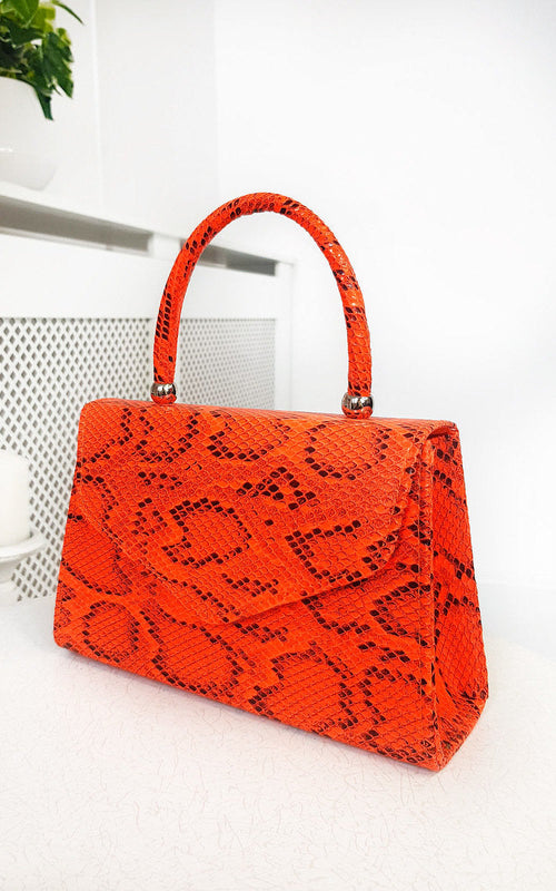 Faux Leather Handbag in Lilac with Top Handle and Chain Strap