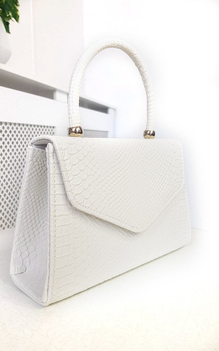 Faux Leather Handbag in Lilac with Top Handle and Chain Strap