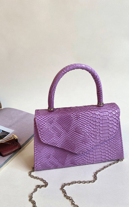 Faux Leather Handbag in Lilac with Top Handle and Chain Strap