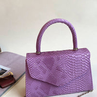 Faux Leather Handbag in Lilac with Top Handle and Chain Strap