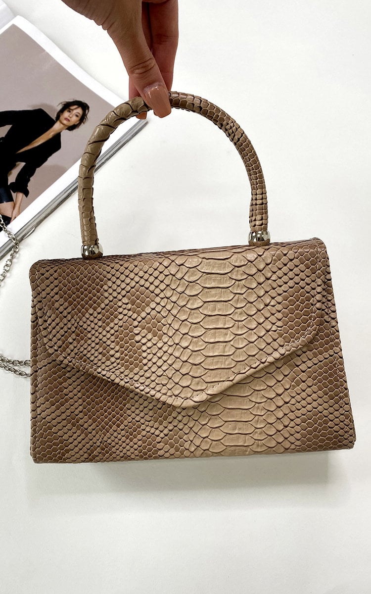Faux Leather Handbag in Lilac with Top Handle and Chain Strap