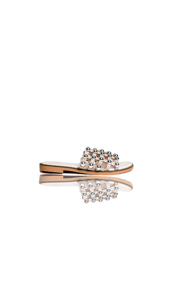 Studded lattice flat slide sandals with crystal-toned jeweled strap, tan sole