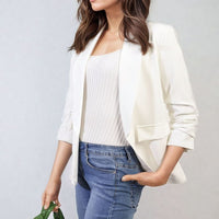 White blazer jacket with open front, ruched sleeves, and front pockets, 3/4 view