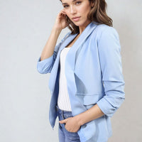 Sky blue open-front blazer jacket with ruched sleeves and front pockets